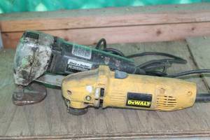 lot 202 image: Tools DeWalt 4 Grinder and Black and Decker Saw