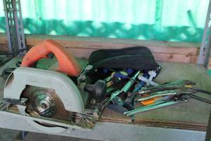 lot 203 image: Tools Milwaukee Circular Saw and Bag of hand tools
