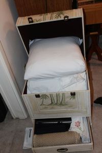 lot 98 image: Trunk and Contents, including pillow, pillow cases, sheets, place mats and napkins