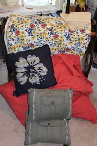 lot 103 image: Queen size quilt, pillows with cases, 3 throw pillows and quilt rack