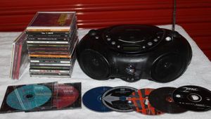 lot 33 image: Portable CD Player and CDs