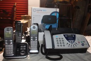 lot 34 image: Panasonic Cordless Telephone system, Fax Machine and Ooma VIOP