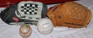 lot 81 image: Very Gently Worn Baseball Gloves and Baseballs