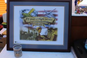 lot 133 image: Framed Artwork 85 Years of Flight Service