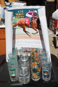 lot 28 image: Kentucky Derby Collectors Glasses and Gun Runner Poster