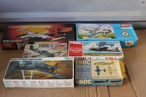 lot 26 image: Unassembled Vintage Model Kits as shown