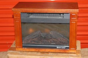 lot 252 image: Electric Fire Place by Heat Surge 26x32x11 Model x23A Movable Heated Fireplace