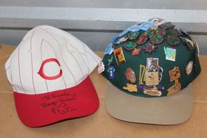 lot 297 image: Autographed Reds Hat and Hat Full of Pins