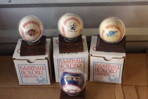 lot 301 image: Commemorative Baseballs in Display Holders