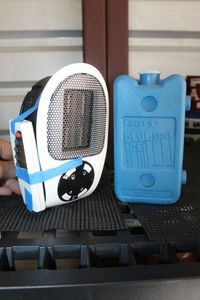 lot 305 image: Small Portable Heater with Remote and Ice Pack