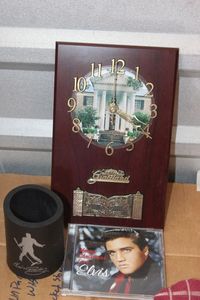 lot 328 image: Elvis Presley Clock, Koozie and CD