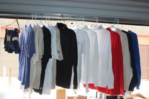 lot 362 image: Mens Clothing Socks Still in Packing, T-shirts and Team Apparel Turtlenecks