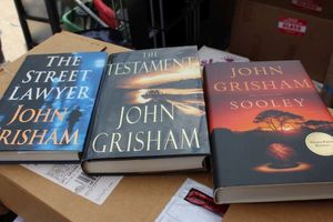 lot 366 image: John Grisham 1st Edition Hard Back Books The Street Lawyer, The Testament and Sooley. Sooley is Autographed by John Grisham
