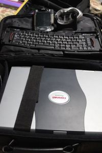 lot 375 image: Targus Computer Bag, Compaq Presario 1700, Windows XP, Powers on Missing Keys. Compaq iPAQ Pocket PC, Factory Restored. Compaq iPAQ Stowaway Portable Keyboard.