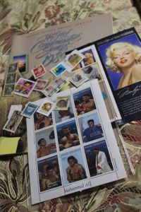 lot 378 image: USPS Mint Setsof Commemorative Stamps1989 Muhammad Ali and Marilyn Monroe and Vintge Lincoln, Airmail, Elvis, Roosevelt, Crayola, White House, Christmas, and Eisenhower