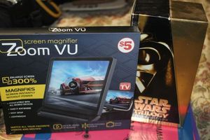 lot 384 image: Zoom Screen Magnifier and Star Wars VHS Collectors Set