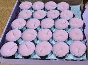 lot 34 image: PINK TEALIGHTS IN BOX AS SHOWN.