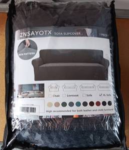 lot 56 image: ZNSAYOTX DARK GRAY SOFA SLIPCOVER IN PACKAGE AS SHOWN.