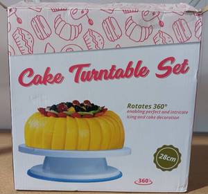 lot 97 image: CAKE TURNTABLE SET IN BOX AS SHOWN.