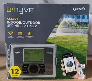 lot 100 image: ORBIT B-HYVE SMART INDOOROUTDOOR SPRINKER TIMER, 12 STATIONS 5795057950-21E IN BOX AS SHOWN. WIFI ENABLED AND SMART SCHEDULING FEATURE.