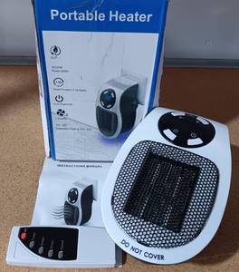 lot 101 image: PORTABLE HEATER IN BOX AS SHOWN.