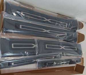 lot 219 image: RQING TESLA MODEL X20, PLATE COVER TRIMS BLACK, IN BOX AS SHOWN.