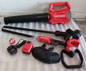 lot 263 image: YOUR BID X 2 CRAFTSMAN WEED WACKER AND BLOWER CMCK497P1 IN BOX AS SHOWN