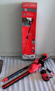 lot 264 image: CRAFTSMAN POLE HEDGE TRIMMER, MO# CMCPHT818, IN BOX AS SHOWN.