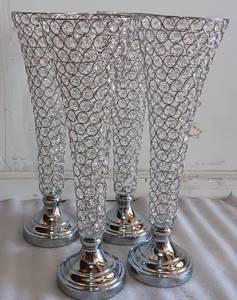 lot 278 image: LOT OF 4 DECORATIVE VASES IN STYLE  DESIGN SHOWN.