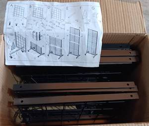 lot 292 image: BLACK WIRE DISPLAY FIXTURE WITH WHEELS AS SHOWN,