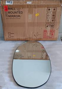 lot 307 image: WALL MOUNTED BLACK MIRROR IN STYLEDESIGN SHOWN.