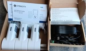 lot 329 image: ETEKCITY ZAP REMOTE OUTLETS AND SOULBAY 30W MULTI DC TIPS UNIVERSAL AC ADAPTER AS SHOWN.