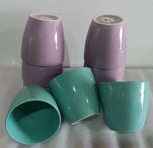 lot 245 image: YOUR BID X 9 NEW, STONEWARE FLOWER POTS (BLUE AND PURPLE) AS SHOWN. 4.72 X 4.52 EACH.