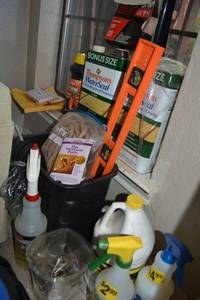 lot 30 image: Thompsons WaterSeal, Fire Ant killer, Green Light Root Stimulator Solution and spray bottles