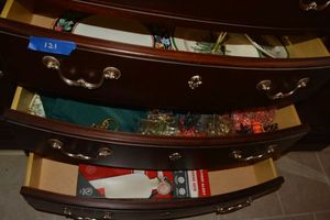 lot 121 image: Christmas 2-tier plate, Dining placemats, Assorted Napkin rings wire and faux gems, and cloth napkins from Williams Sonoma. Shrimp napkin rings from Alaska artisan, and Marine Auto Fire extinguisher unopened