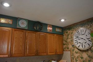 lot 126 image: Wooden Wall Clock and metal decorative signs