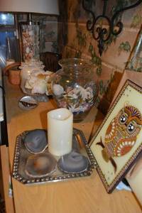 lot 142 image: Home Dcor Shell filled Table Lamp, Decorative Glass panel with etched flower, Painted owl artwork, Stone slices, green iron bird trivets, Ceramic flower powder dish and more