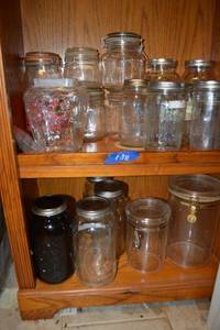 lot 138 image: Ball jars (one is brown glass) and bale wire jars