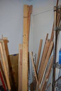 lot 157 image: Wood studs and trim pieces, wood plank 2x10x12