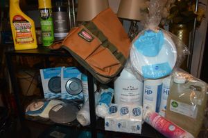 lot 161 image: BucketBoss tool organizer, Organic Sunflower Oil, Hydrogen Peroxide, Isopropyl Alcohol, Zote soap bars, bathtub and sink stoppers, Fish fertilizer, Great Stuff Pestblock, Organic insect killer