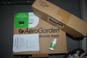 lot 172 image: AeroGarden Hydroponic Garden Bounty Basic with Grow light unopened in box