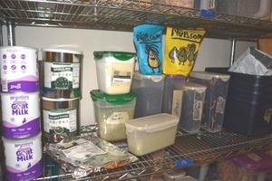 lot 193 image: Small storage totes, LocknLock Containers with Organic Prep Food Dried Guajillo Peppers, Coffee Beans, coffee filters, Leek Powder, Fennel Candy, Buttermilk powder, Spirulina, Goat Milk, Couscous