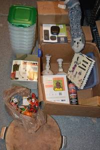 lot 197 image: Cuisinart Food scale, Empty LocknLock containers, Photo album, Pizza Stone, Refrigerator magnets, Ganesha, Cleaning Wax, Smart Video Doorbell speaker, Organic Prep Food Teas