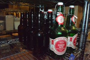 lot 236 image: Green and Brown Beverage Bottles