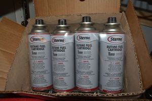 lot 274 image: Butane Fuel Cans.