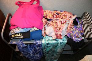 lot 326 image: Exercise clothing and swimsuits, see photos for sizes. Also Callaway Golf jacket size L