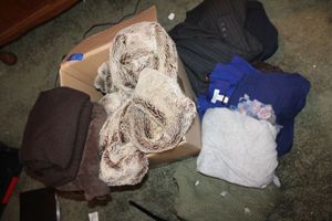 lot 322 image: Womens clothes and brown plush blanket includes Saks 5th Avenue, CW pinstripe 3-piece suit