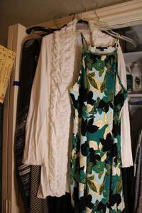 lot 298 image: Boston Proper green  dress, Long white cardigan sweater, Sheer black dress with dress underneath with bright embroidered flowers, Grey cardigan sweater