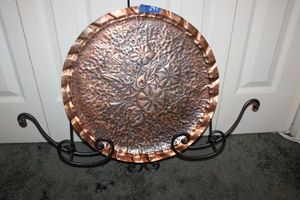 lot 297 image: Wrought iron wall hanging with Copper colored decorative platter