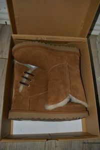 lot 74 image: UGG Boots size 10 Tan Constantine - Look New Never Worn
